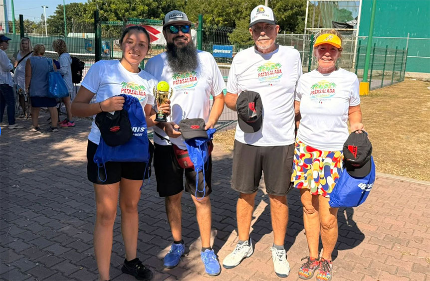 Team members from Pata Salada Mazatlán Pickleball Club posing with their gear and tournament trophy.